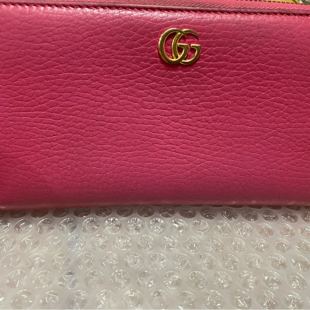 Gucci GG Marmont zip-around wallet in shocking pink